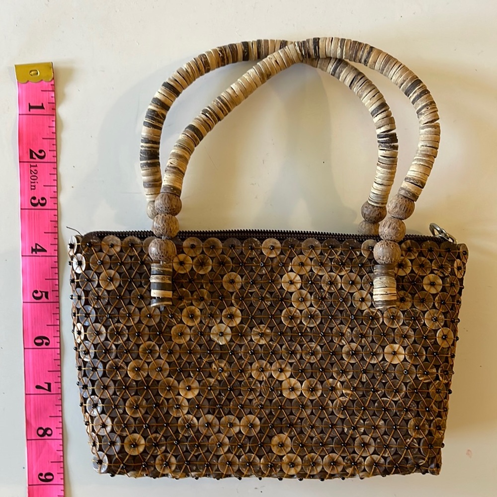 Handmade bag from Thailand. Excellent condition. Can fit an iPhone max pro.